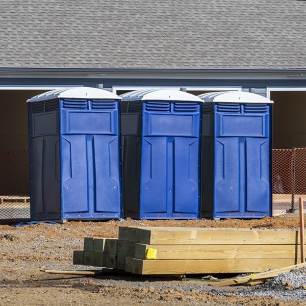 what is the cost difference between standard and deluxe porta potty rentals in Highland